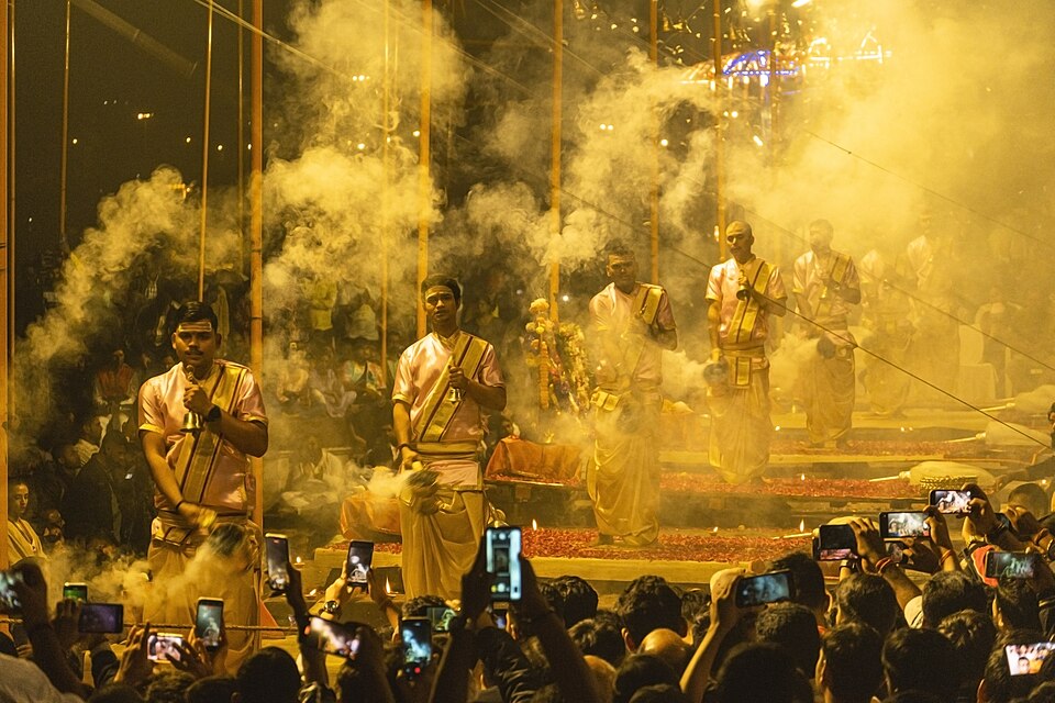 Priests performing evening Ganga Aarti in Varanasi
